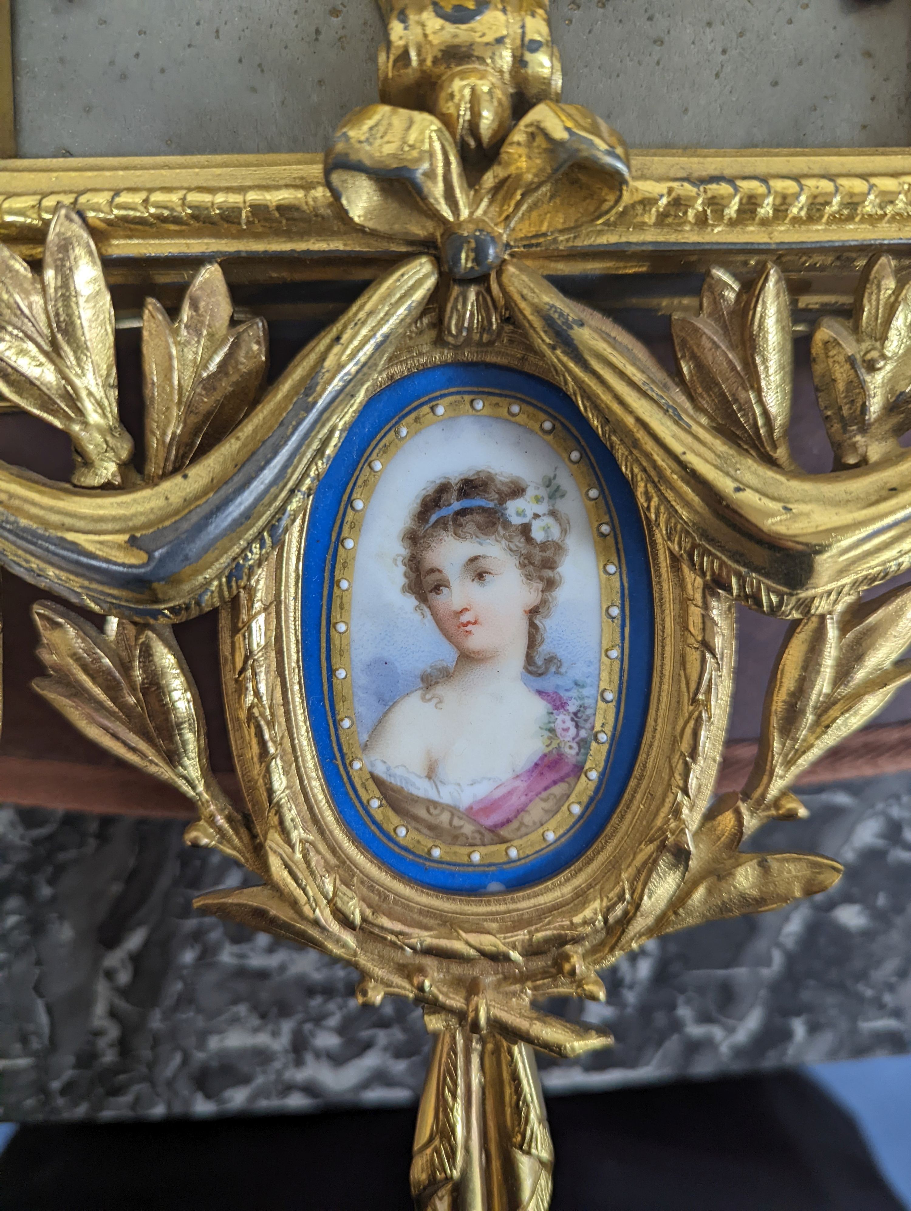 An early 20th century gilt metal and Sevres style porcelain mounted wall clock 58cm